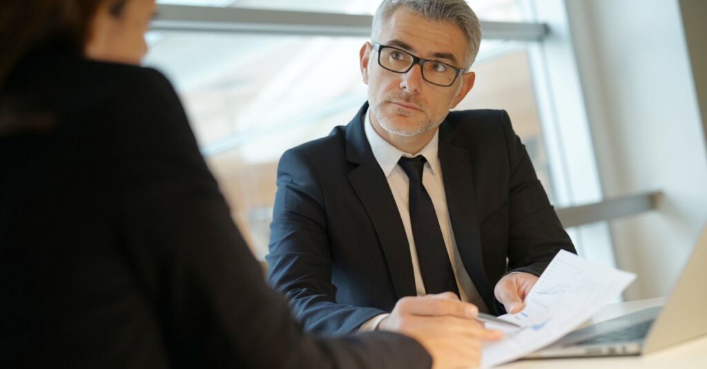 A person meeting with a personal injury lawyer